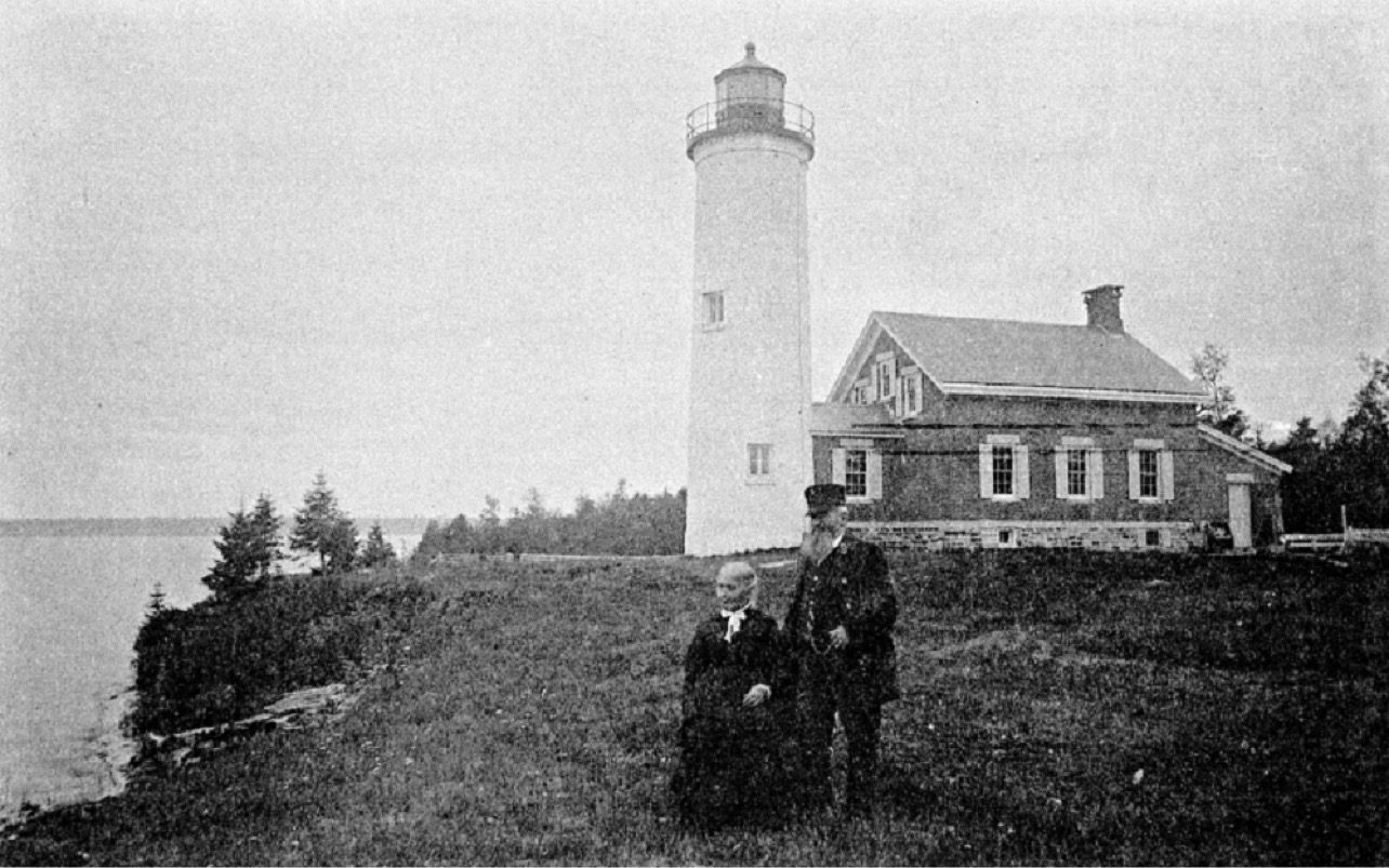 Historic photograph of the Portage River lighthouse keeper and his wife
