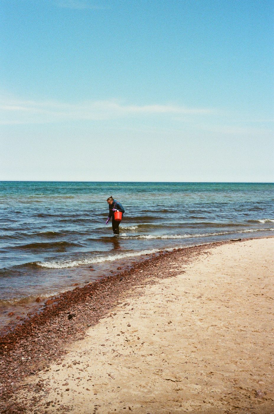 Lake Superior shoreline, wading in the shallows on a clear day